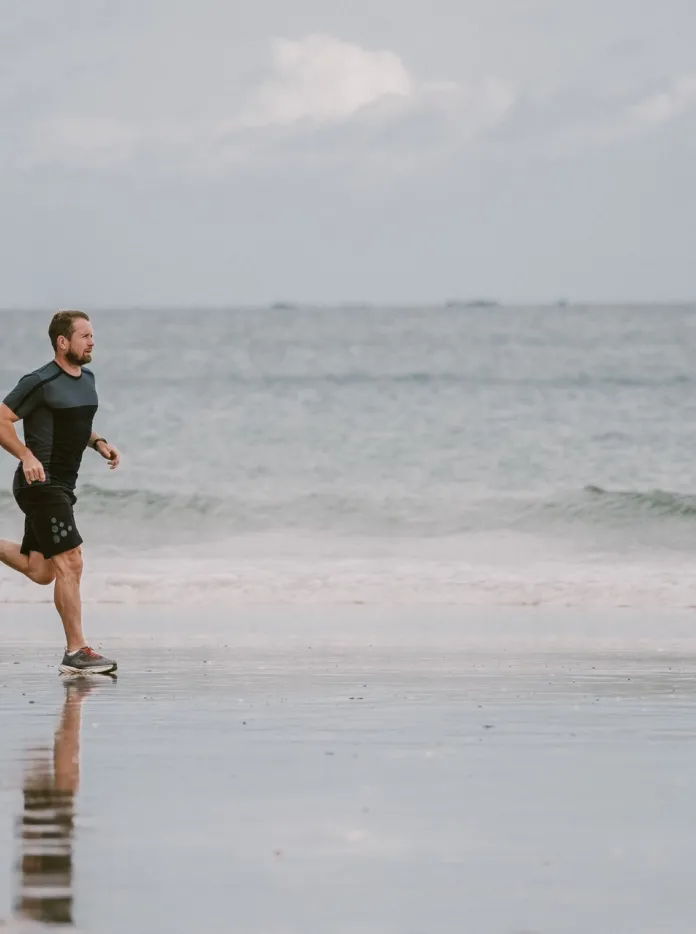 Shane Williams running along the beach