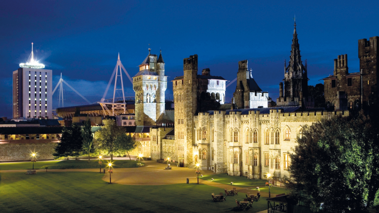 Exterior shot of a large old castle at night