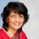 Meena smiling at camera