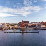 An image of buildings on the waterfront at Cardiff Bay 