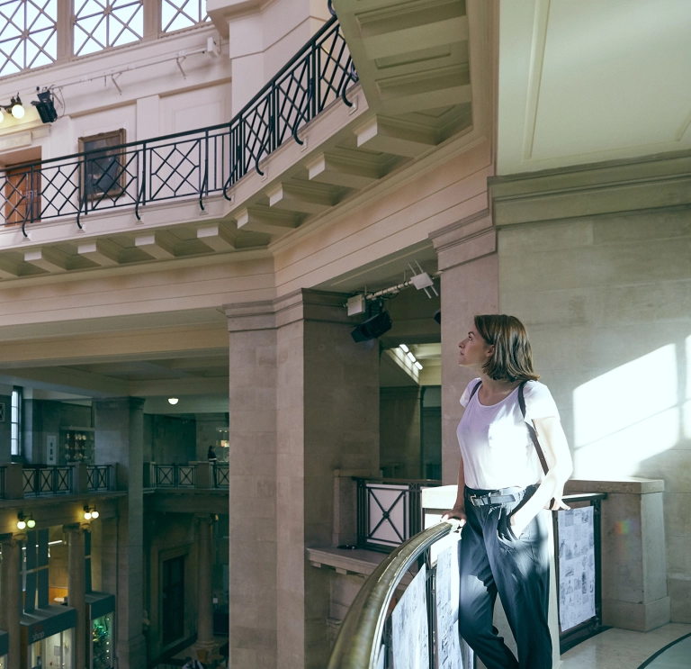 female looking up in National Museum Cardiff