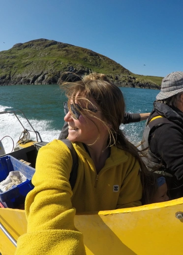 Two people in a speedboat.