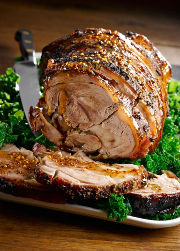 Honey-glazed leg of lamb with ginger and mustard