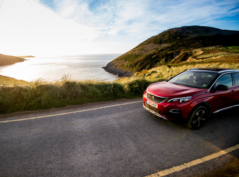 Car driving along road in Mwnt, Ceredigion