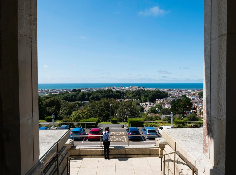 Looking out of the main entrance of the museum with the sea in the distance.