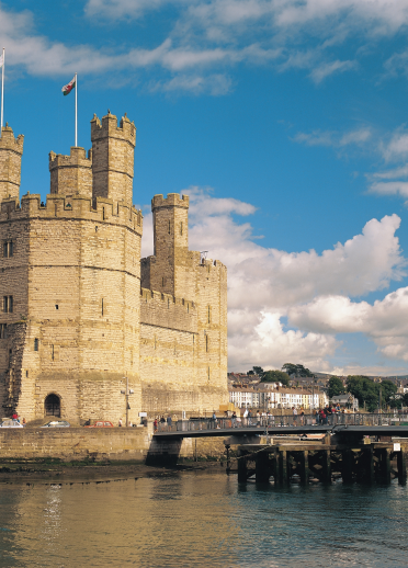 people walking into Caernarfon Castle