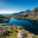 Blue lake surrounded by high mountains