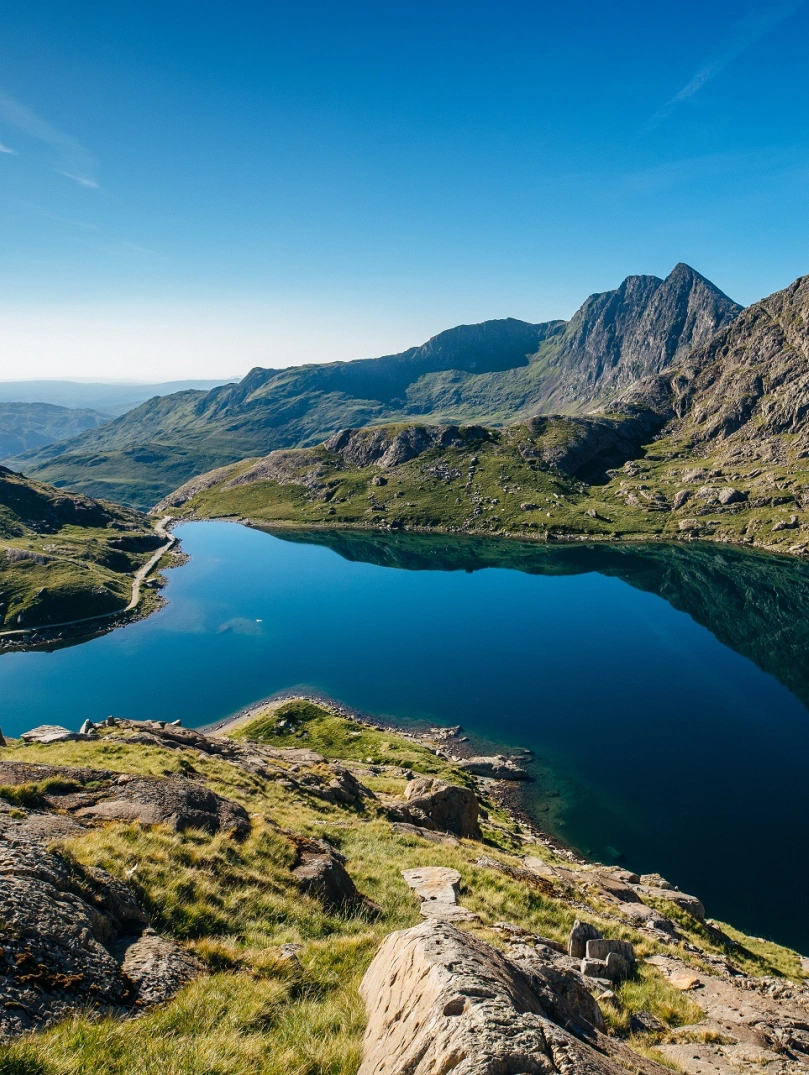Blue lake surrounded by high mountains