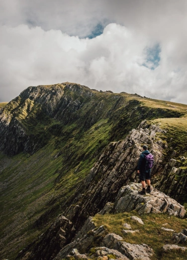 Walker near Cader Idris, Snowdonia National Park.