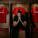 Sam Warburton in the Wales rugby team changing room staring down the lens of the camera.