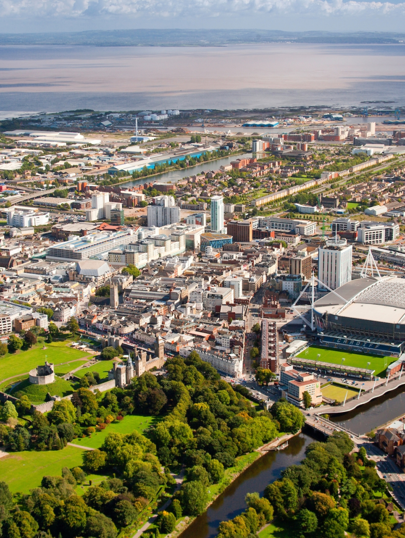 Aerial view of city centre and Bristol Channel, Cardiff, South East Wales