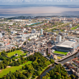 Aerial view of city centre and Bristol Channel, Cardiff, South East Wales