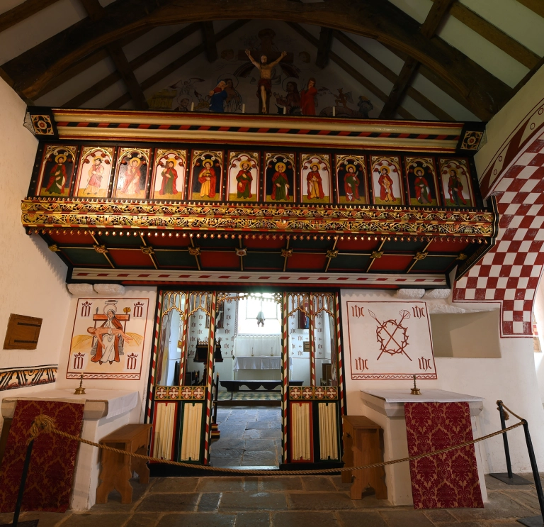 interior of church with highly decorative walls.