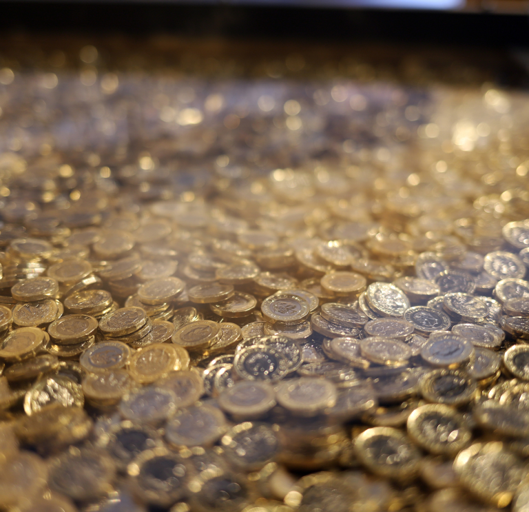 hundreds of one pound coins.