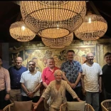 group smiling at camera in India