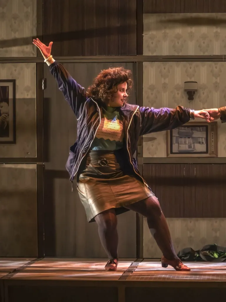 Two opera singers performing onstage